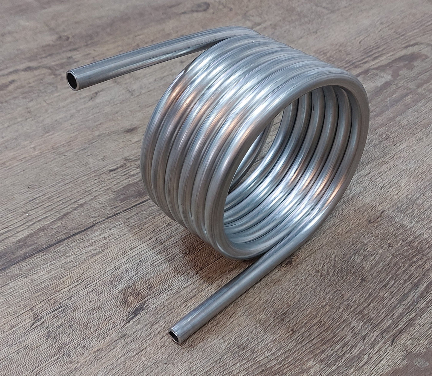 Spirale aus 2,5m, 5m, 7,5m Edelstahlrohr 10x1mm AISI 316L EN 1.4404 mit Innend. ca. 104mm