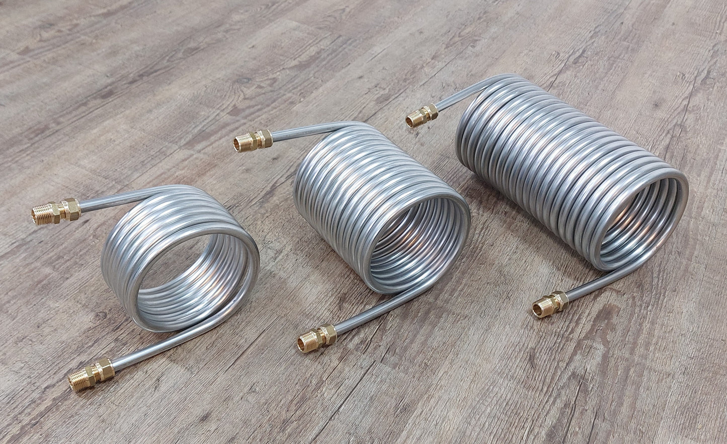Spirale aus 2,5m bis 10m Edelstahlrohr 8x1mm AISI 316L EN 1.4404 mit Innend. ca. 104mm inkl. 1/4" AG Anschluss