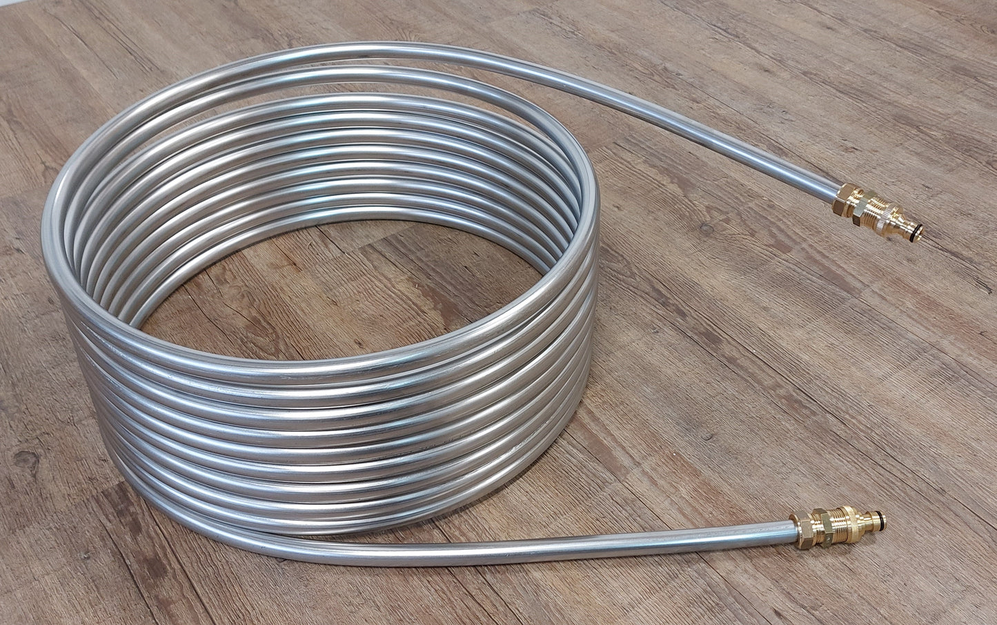 Spirale 15m Edelstahlrohr 18x1mm AISI 316L EN 1.4404 mit Außend. von ca. 46,5cm mit GARDENA Anschluss