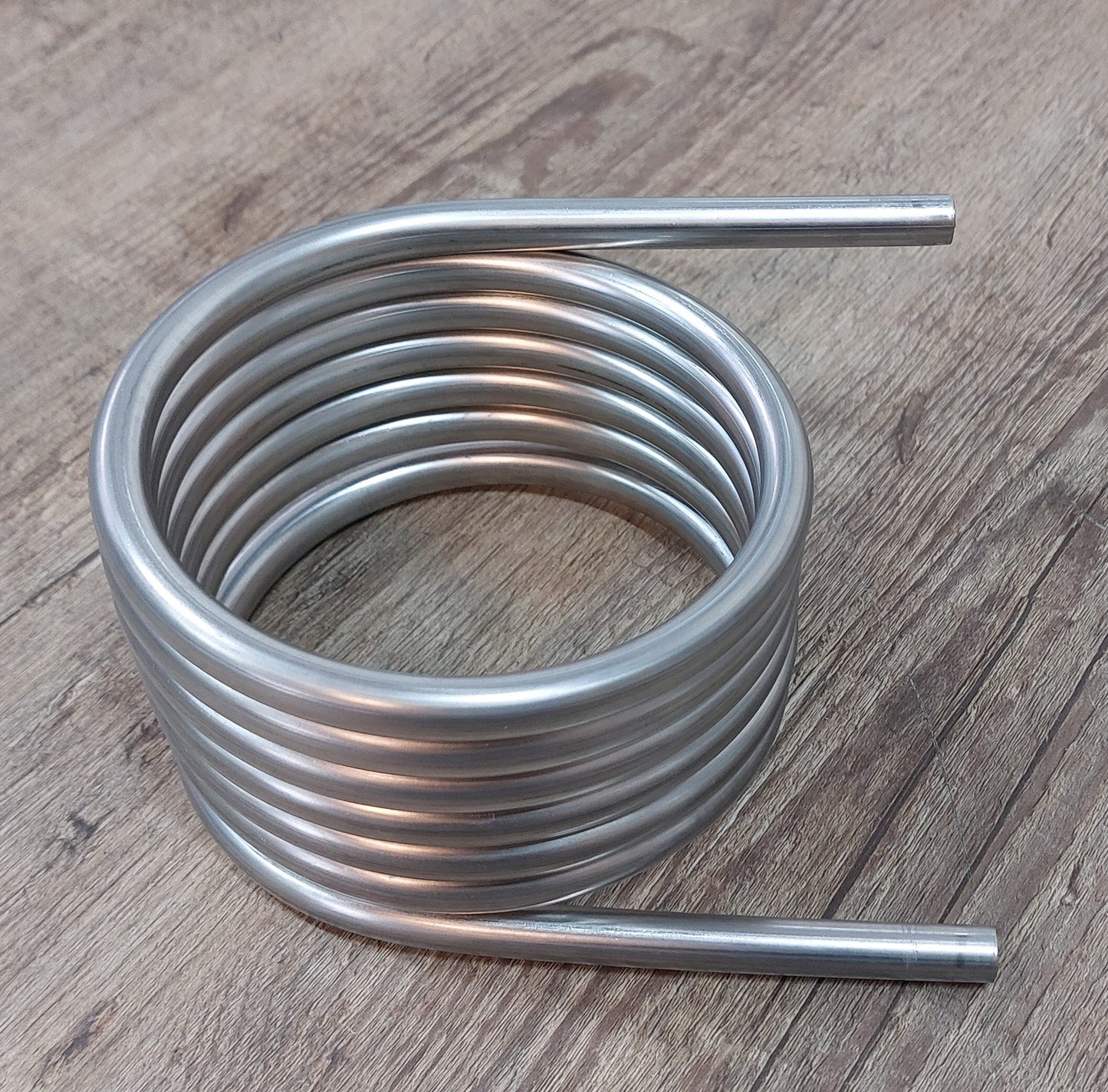 Spirale ca. 126mm Außend. aus 2,5m-15m Edelstahlrohr 12x1mm AISI 316L EN 1.4404 mit 1/2" Anschluss